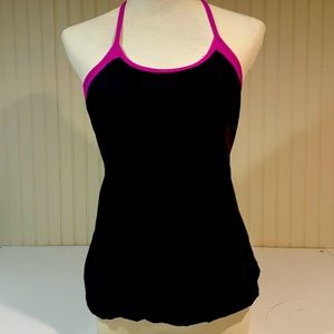 Lululemon built in sports bra a tank top. Barely worn